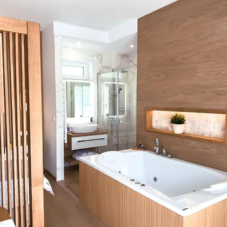 M26 Prémium Aparthotel 4*